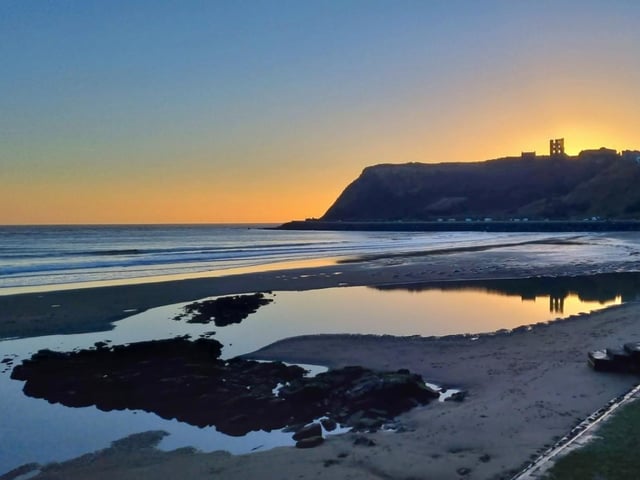 Sunrise and reflection of the castle in North Bay