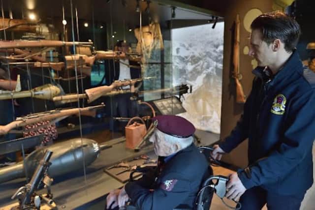 Ray Whitwell visiting the Airborne Museum with the Taxi Charity.