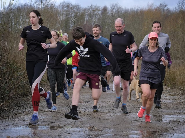 Jumping over the puddles at North Yorkshire Water Park parkrun
Photo by Richard Ponter
