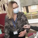 Sharon Moss, one of North Yorkshire’s registered care home managers, shares
precious time with a resident during the Covid-19 pandemic.