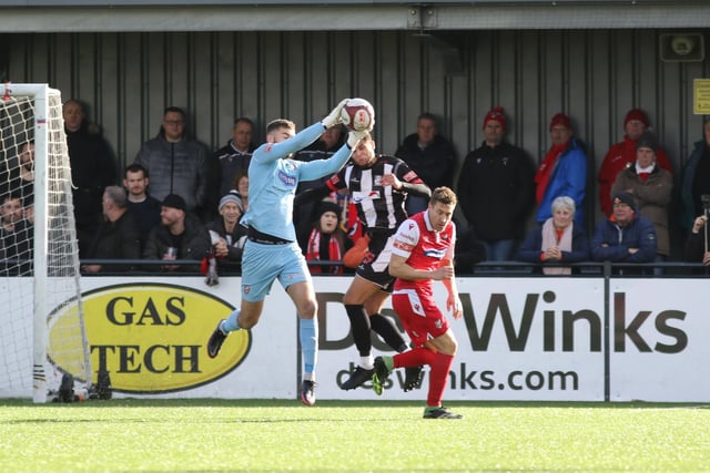 Scarborough Athletic goalkeeper Ryan Whitley claims the ball safely