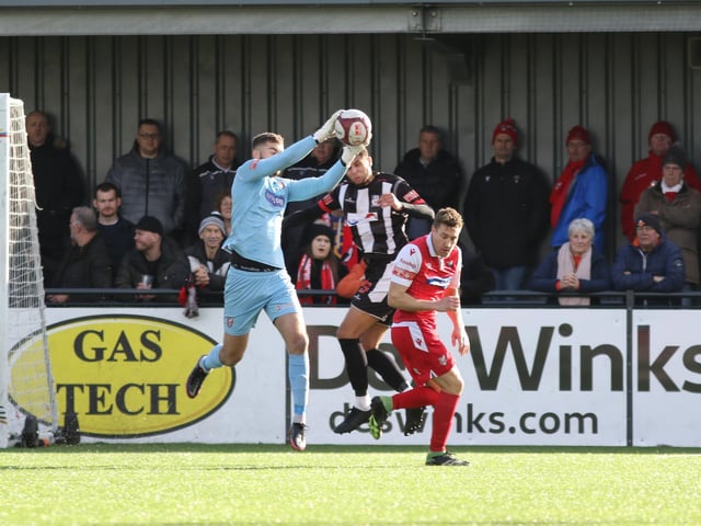 Scarborough Athletic goalkeeper Ryan Whitley claims the ball safely