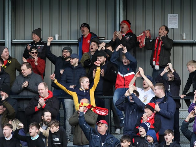 The fans celebrate Kieran Weledji's late leveller for Scarborough Athletic against Stafford Rangers