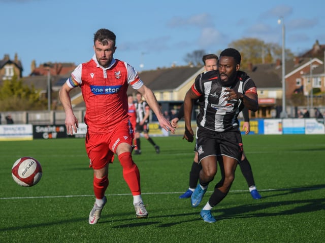 Skipper Ryan Watson races for the ball for Boro