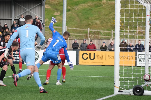 The ball goes into the net after Kieran Weledji's late leveller for Scarborough Athletic against Stafford Rangers