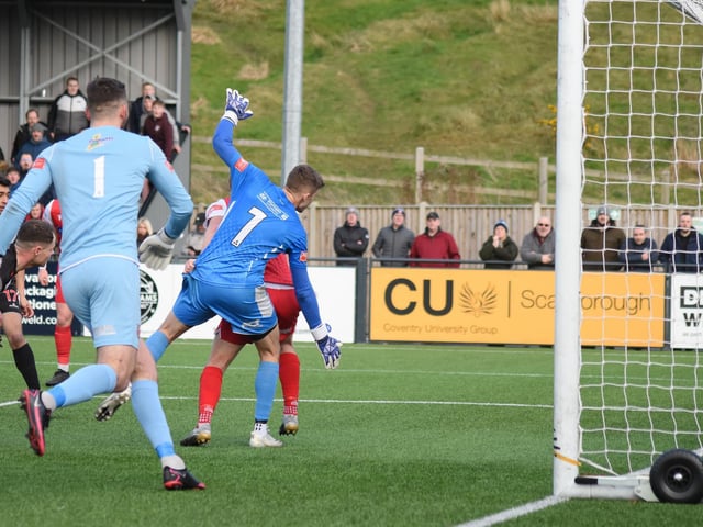 The ball goes into the net after Kieran Weledji's late leveller for Scarborough Athletic against Stafford Rangers
