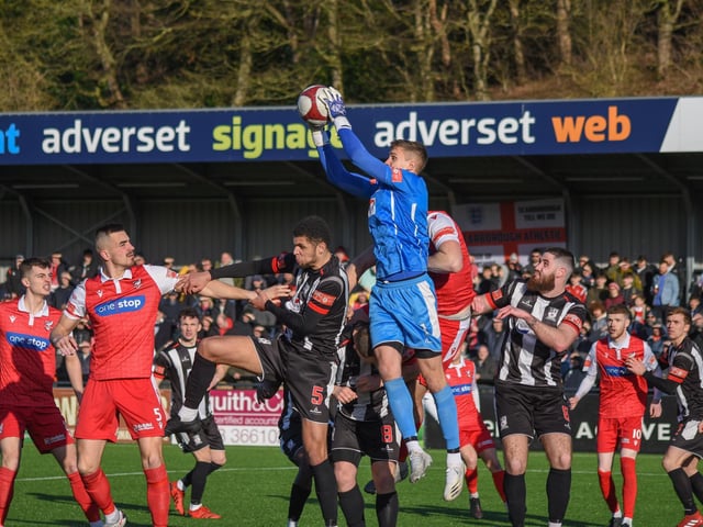 The Stafford goalkeeper claims the ball in the 1-1 draw at Scarborough Athletic.