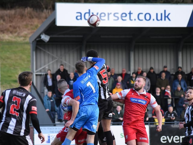 Boro striker Jake Day looks on as the Stafford keeper punches the ball away