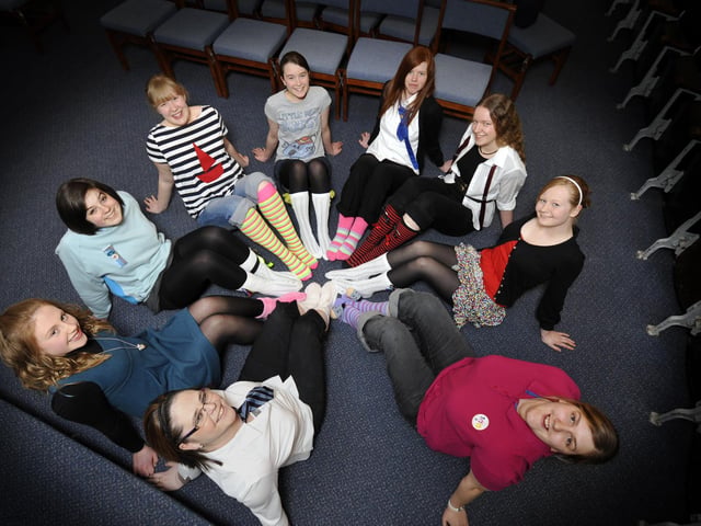 Girls from the 2nd Westborough Rangers look forward to ‘socking it’ to the audience at their show at Westborough Methodist Church, as part of the Changing the World national Guides project.