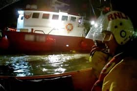 The fishing boat about to enter the harbour, taken from the inshore lifeboat. (Credit: Adam Sheader)