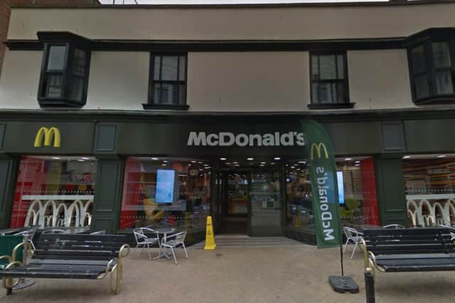 Man steals iPhone from a group of girls at McDonald's on Huntriss Row.