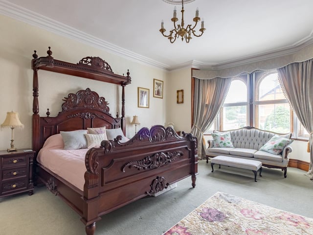 This room is light and bright, courtesy of a wide bay window.
