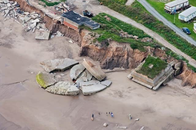 This photograph shows Fort Godwin, Kilnsea – the First and Second World War battery – with large parts on the beach.
