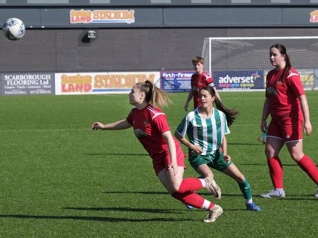 Amber Colling keeps her full focus on the football