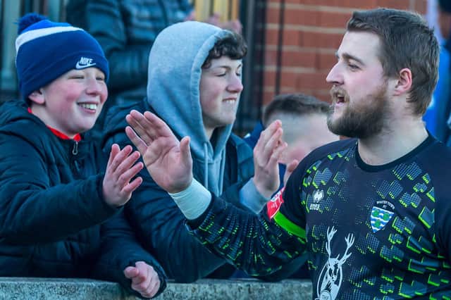Whitby Town keeper Shane Bland thanks the Blues fans after the 0-0 draw at home to Buxton