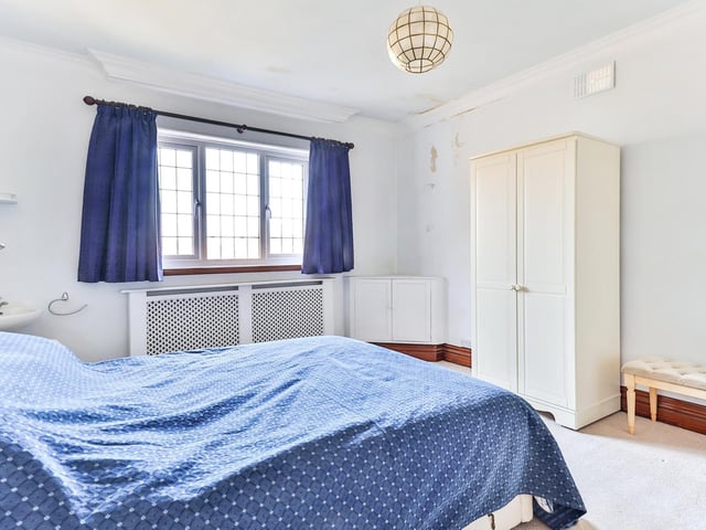 Another double bedroom, that has a wash basin facility.