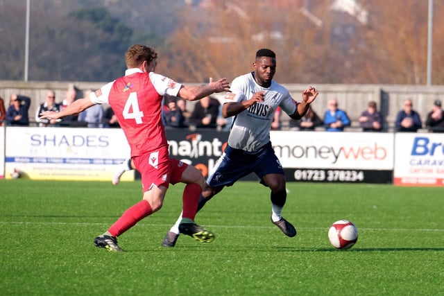 Boro midfielder Simon Heslop tries to halt a Matlock attack