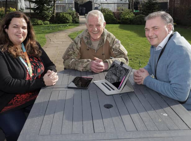 Beyond Housing Volunteer Co-ordinator Lucy Farquharson (left) with volunteers Stephen Donaghue (centre) and Geoff Wears (right) who have been trialling the data bank scheme.