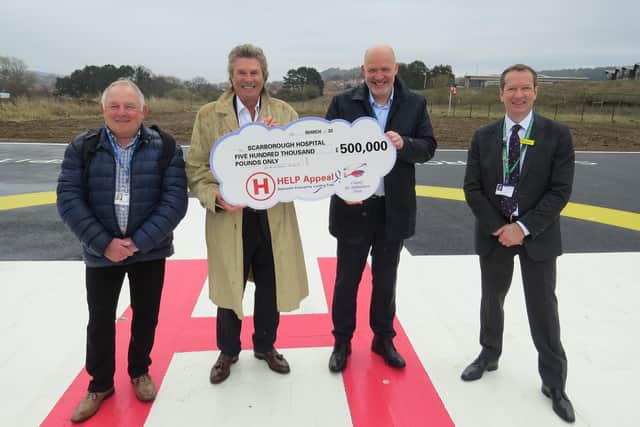 Robert Bertram from HELP presented a cheque for £500,000 towards the cost of the helipad