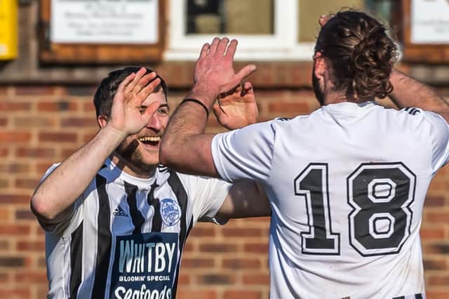 Sleights' Marc Kipling celebrates his goal with a teammate in their 3-1 Ryedale Hospital Cup semi win
Photos by Brian Murfield