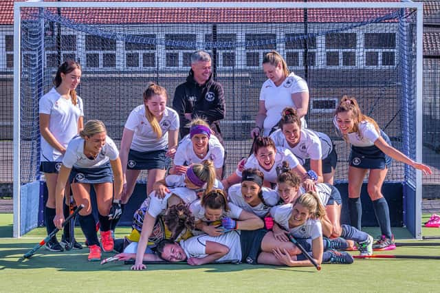 Whitby Hockey Club Ladies line up for a comical photo after their win against Newcastle Uni