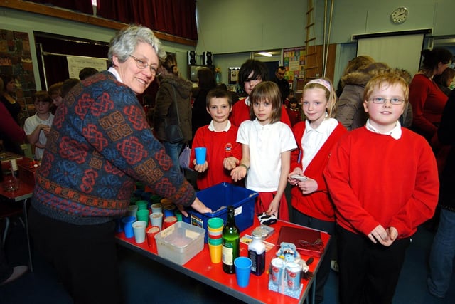 Pictured at the Fylingdales Primary School Easter fair on the tombola is chair of governors Jane Mortimer, with pupils Ryan Straw, Jez Noble, Lewis Brearley, Iona Smith and Megan Straw.
