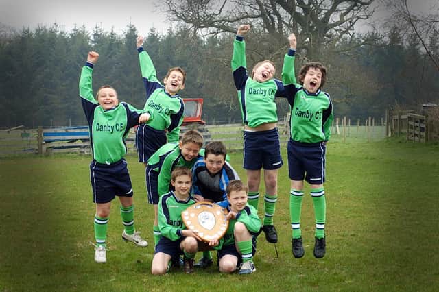 Danby footballers celebrate their recent win at primary inter-schools competition.