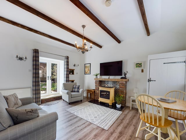 This light and pleasant room has double doors leading outside.
