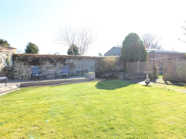 A lawned and walled garden is another attractive feature.