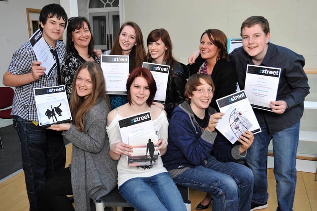 Pictured with their awards are The Street photography competition winners.