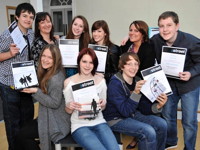 Pictured with their awards are The Street photography competition winners.