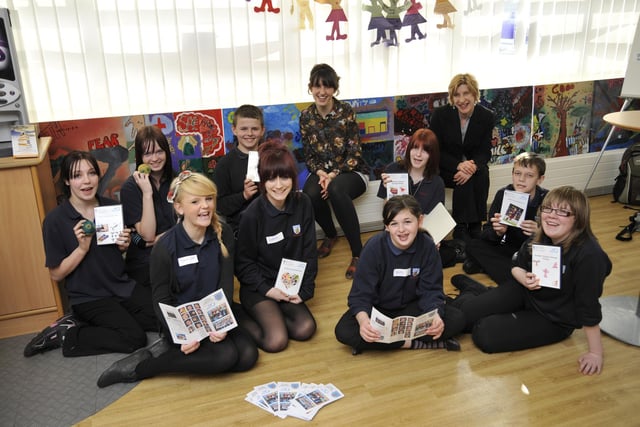 George Pindar Community Sports College Year 9 students hold a creative exhibition at Eastfield Library. Students are pictured with Claire Ford, back left, GPCSC creative practitioner, and Karen Atkinson, back right, library team leader.