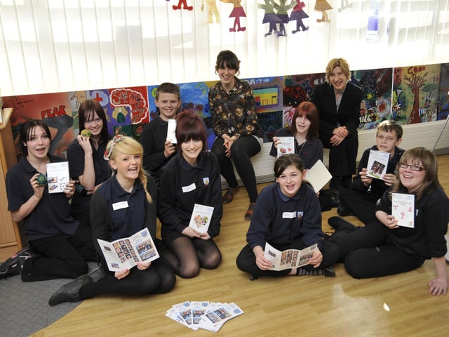 George Pindar Community Sports College Year 9 students hold a creative exhibition at Eastfield Library. Students are pictured with Claire Ford, back left, GPCSC creative practitioner, and Karen Atkinson, back right, library team leader.