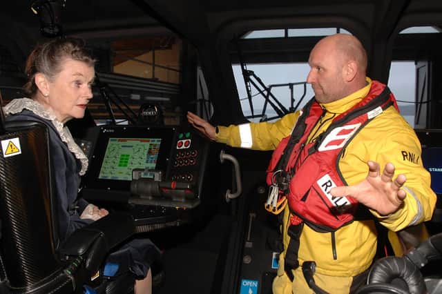 The High Sheriff in the Shannon cabin with coxswain Lee Marton.