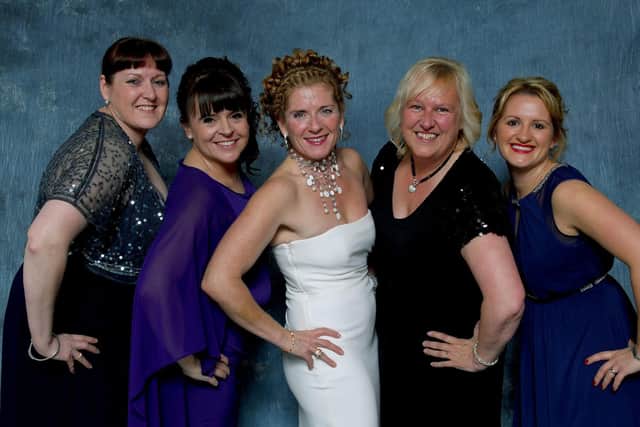 Five ladies pose for the photographer during the Hinge Centre charity dinner at Bridlington Spa in 2014. (2014HingeCentre-0035-2) Photo: Paul Atkinson