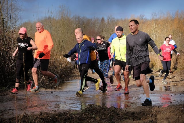 Jumping over puddles at the North Yorkshire Water Park Parkrun