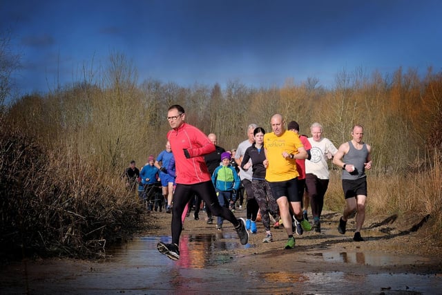 Leaping over the puddles at North Yorkshire Water Park Parkrun