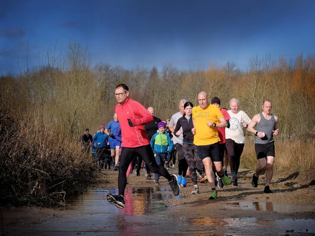 Leaping over the puddles at North Yorkshire Water Park Parkrun