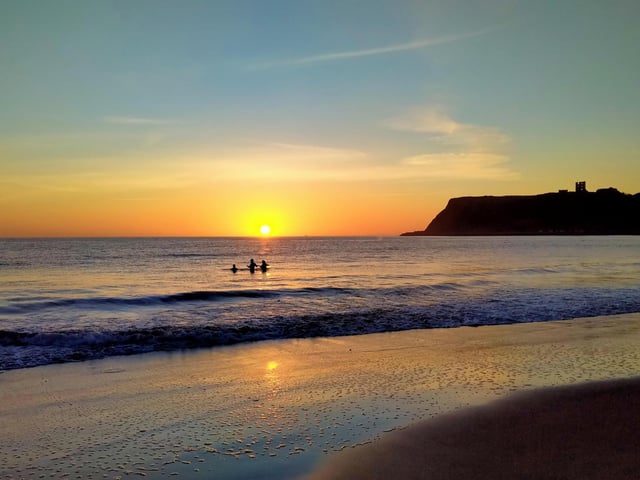 Early morning sea bathers.