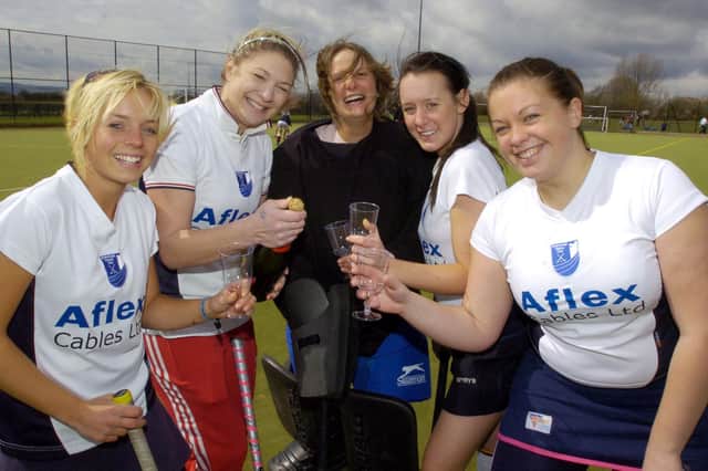 Some of the Scarborough ladies hockey team celebrate their league title. Pictured, from left, Cordy Hack, Sam Wade, Helen Pidd, Alice Hamp and Laura Gibson.