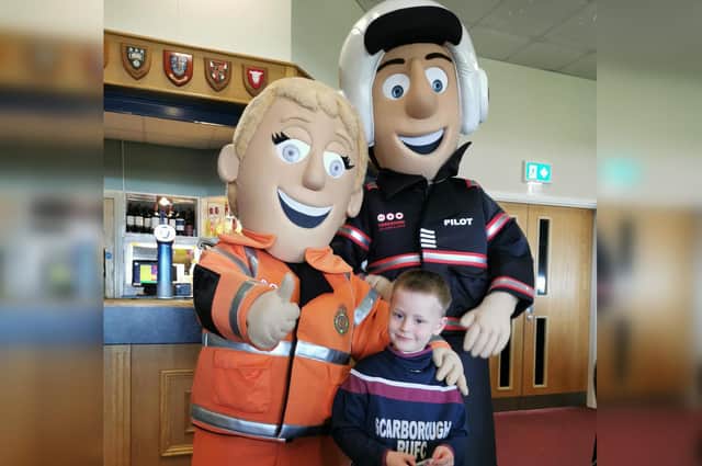 Paramedic Polly and Pilot Percy surprised Jaxon at Scarborough Rugby Club
