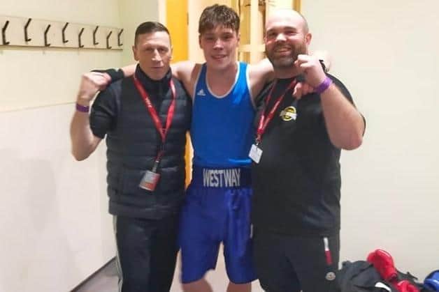 Harry Fisher with his coaches George Rhodes Senior, left, and Ryan Ashworth
