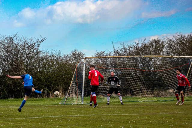 Alex Chapman blasts home a goal for Edgehill Reserves in the 7-3 defeat of Filey Reserves
Photo by Alec Coulson