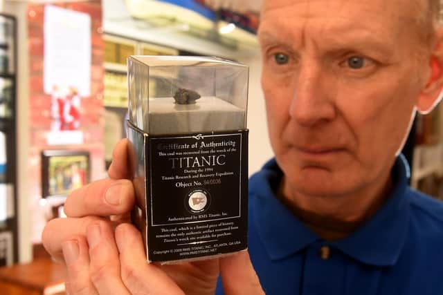 Exhibition on Scarborough's links to the Titanic at the Scarborough Maritime Heritage Centre. Mark Vesey is pictured some coal recovered from the wreck. Image: Simon Hulme