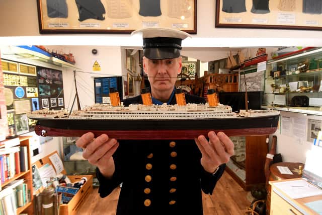 Exhibition on Scarborough's links to the Titanic at the Scarborough Maritime Heritage Centre. Mark Vesey is pictured a replica of the Ship. Image: Simon Hulme