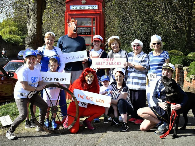 Walkers in 2019 dress up as each of the pubs.