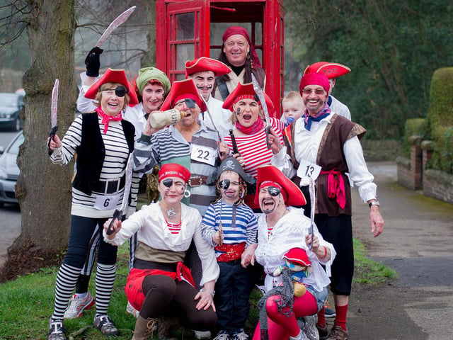 The Brennan, Oxford, Wright and Beaver families dress as pirates in 2015.