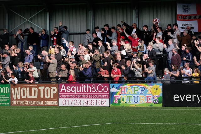The home fans cheer on Scarborough Athletic v Gainsborough Trinity