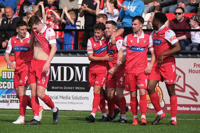 The players celebrate the opening goal by skipper Michael Coulson in the 2-0 win for Boro at home to Gainsborough Trinity