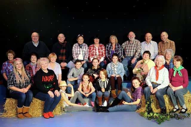 The cast of Spotlight Theatre’s Christmas in a Barn pose for the photographer in 2013. (NBFP PA1349-5a)